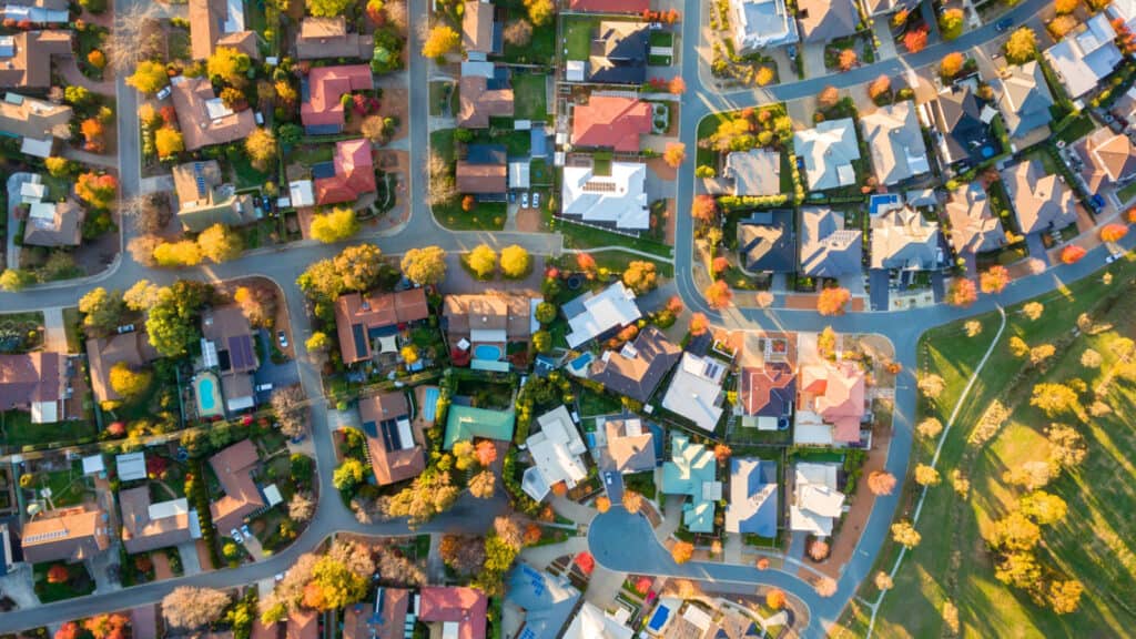 Arial shot of sprawling suburban home neighborhood. 