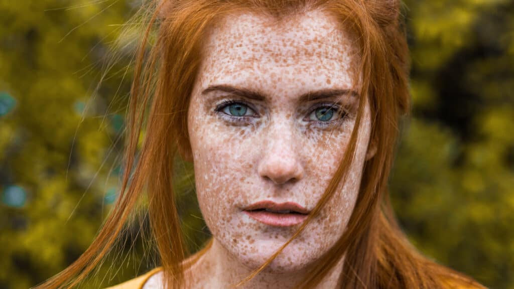 Red head Irish girl with freckles.