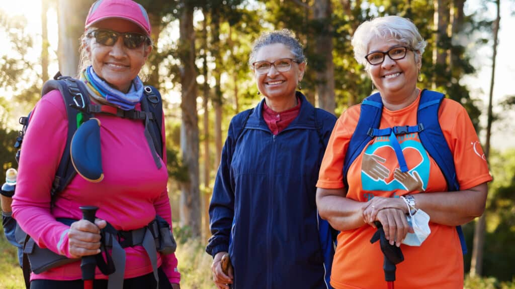 Three women hiking.