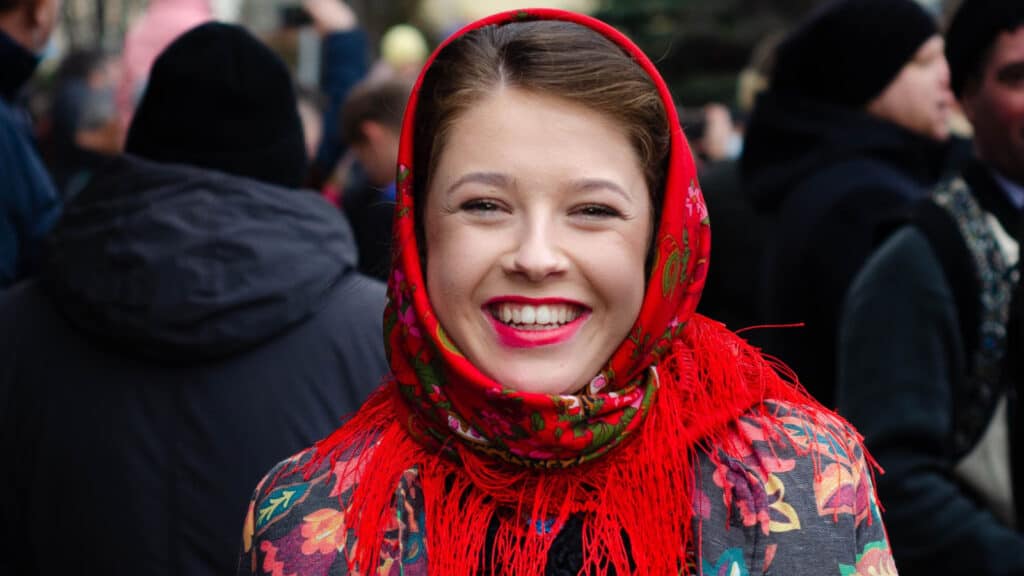 Woman in traditional Romanian headscarf.