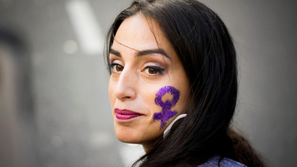 Woman with face painted. Women's rights. 