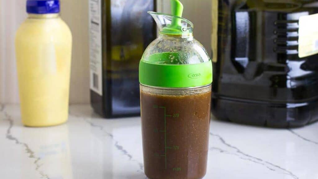 Balsamic-vinaigrette-in-small-carafe-with-spout.