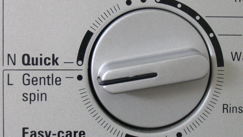 Gentle cycle on dial of washing machine. 