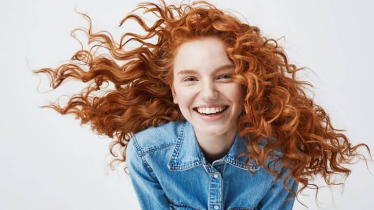 Happy redheaded woman.