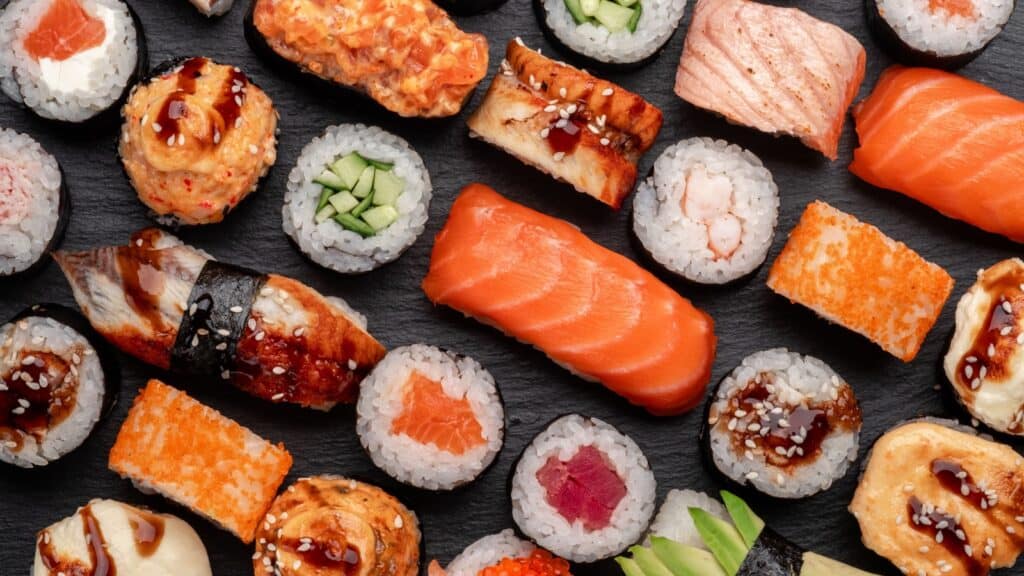 Overhead image of assorted sushi. 