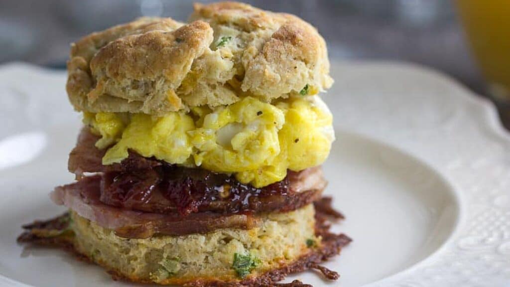 cheddar-scallion-biscuit-stuffed-with-scrambled-eggs-and-ham.