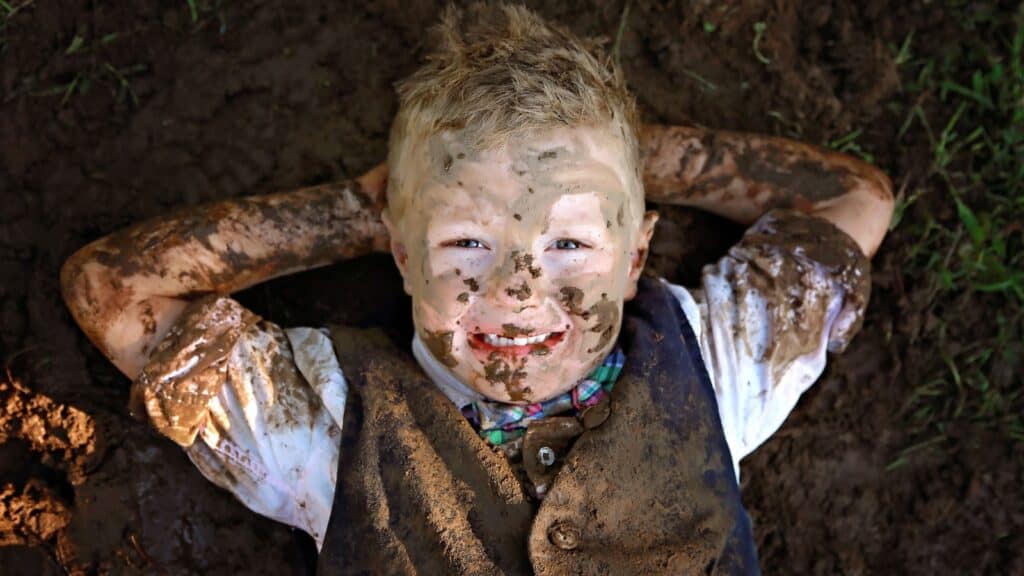 Muddy dirty child.