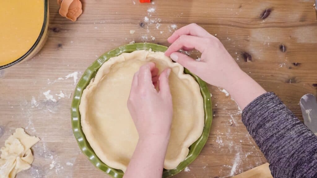 Crimping pie crust.