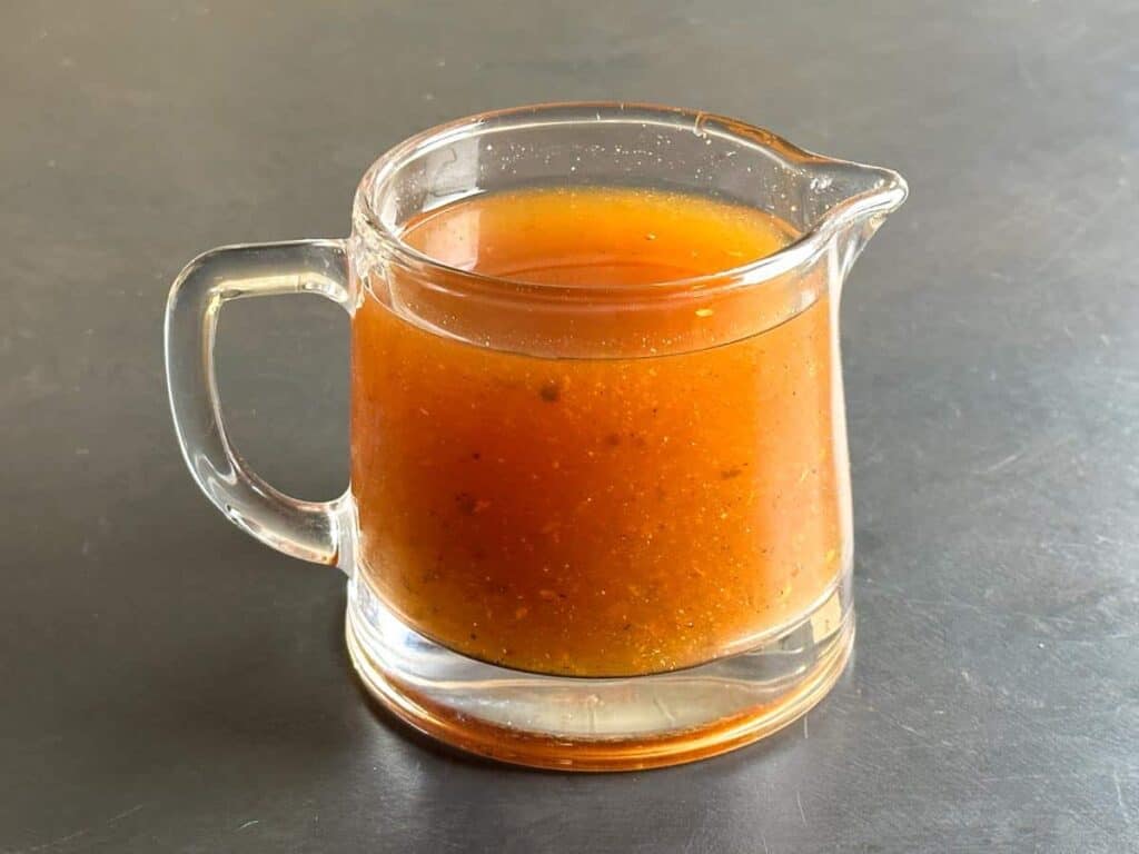 Vinegar-BBQ-Sauce-in-glass-pitcher.