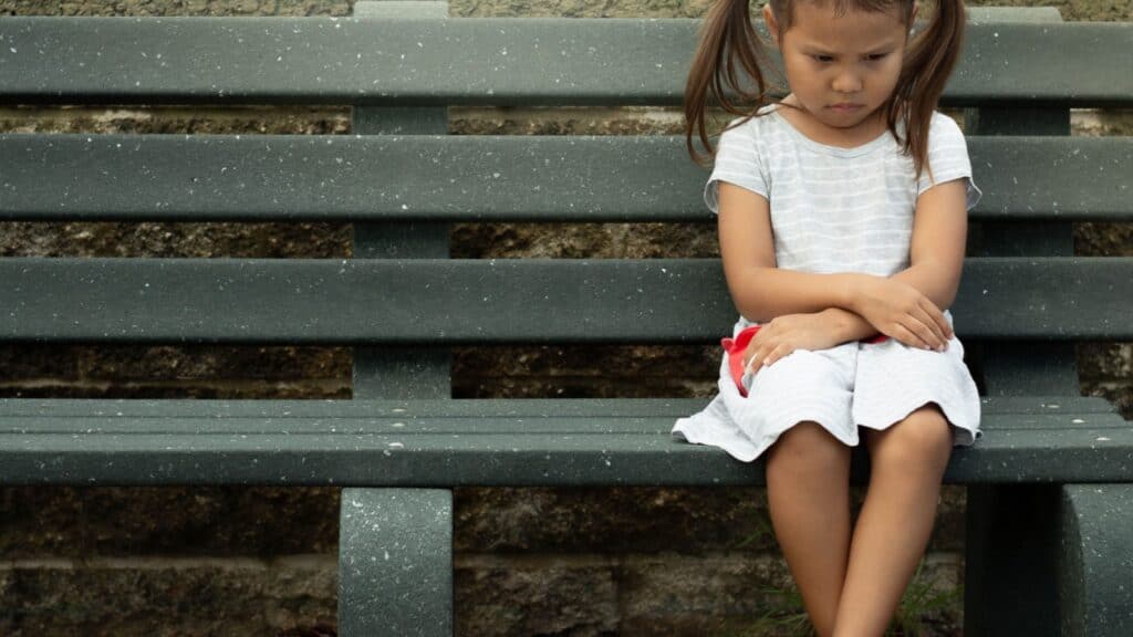 Sad depressed child kid girl.