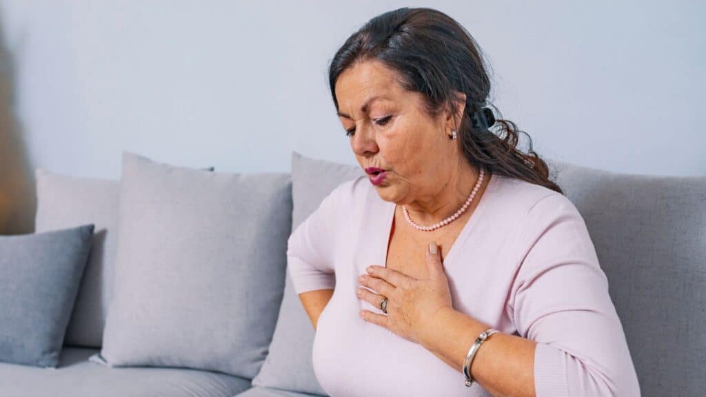 Woman having a heart attack