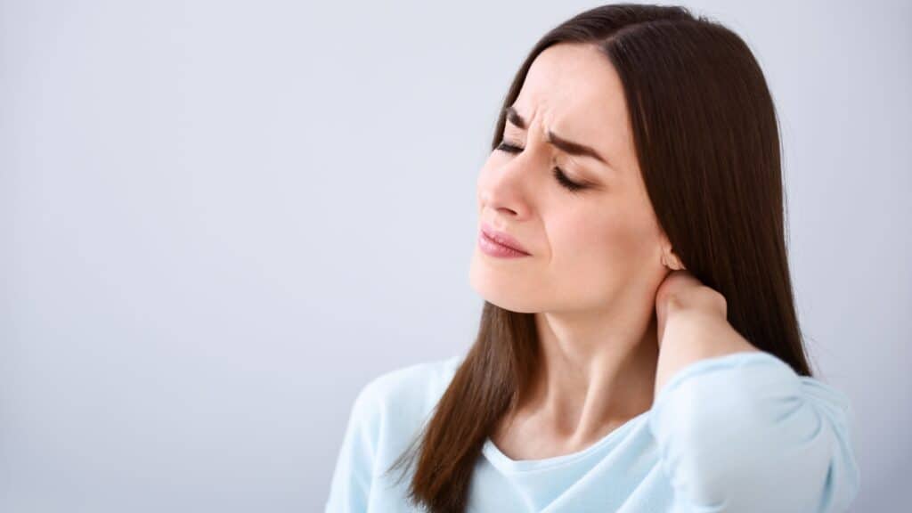 woman with neck pain.