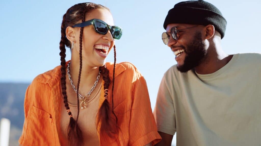 Couple wearing sunglasses.