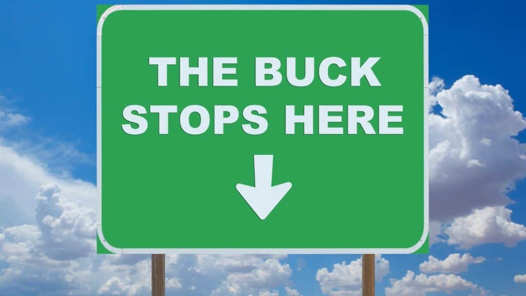 the buck stops here sign - accountability