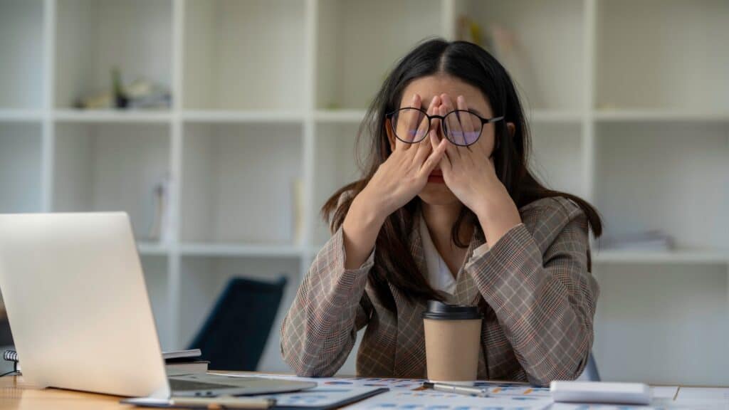 Tired frustrated woman with computer. 