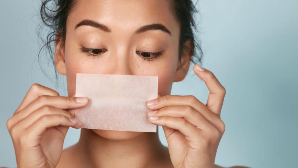 Using blotting papers.