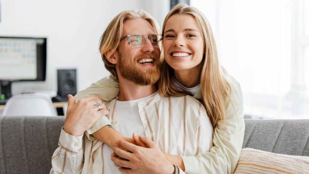 Young couple in home.