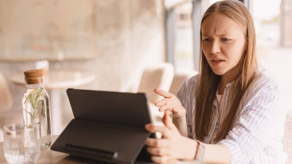 woman not happy with information online.