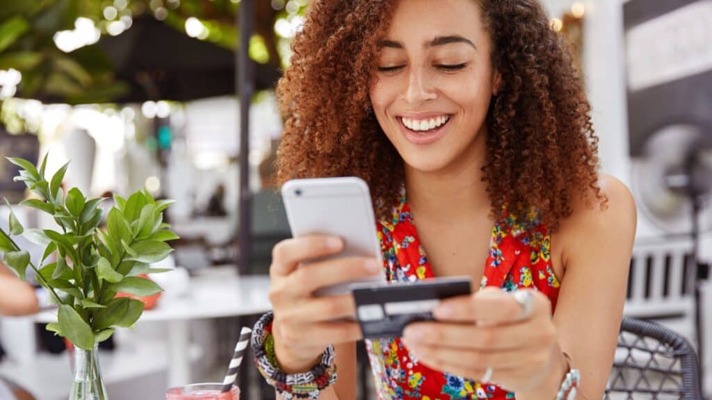 woman using credit card.