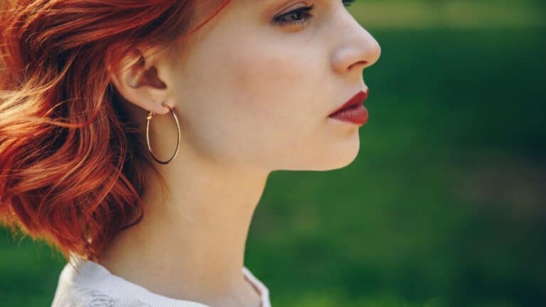 woman wearing earrings.