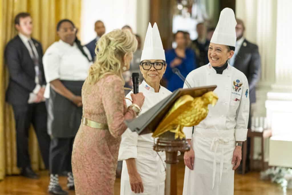 First Lady Jill Biden thanks Executive White House Chef Cristeta Comerford and Executive Pastry Chef Susan Morrison at a reception and dinner with African Summit Leaders, Wednesday, December 14, 2022, in the East Room of the White House. (Official White House Photo by Adam Schultz).