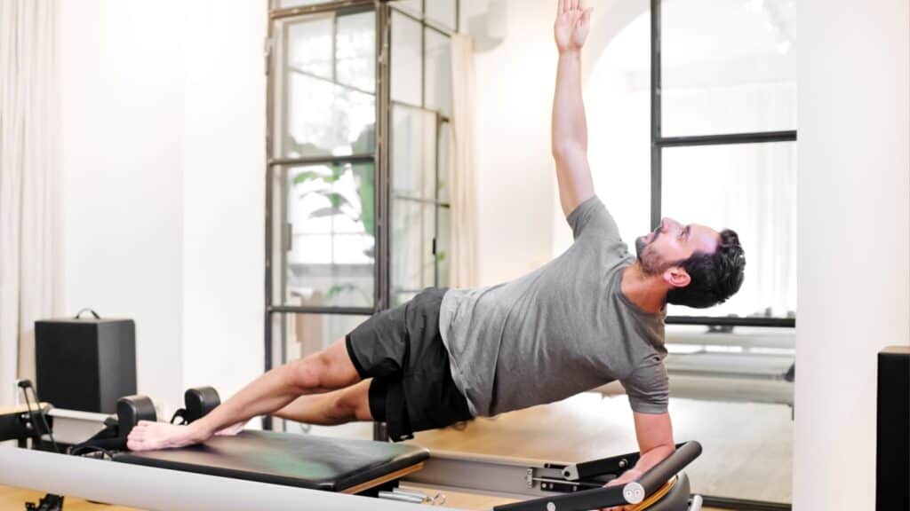 Man doing Pilates. 