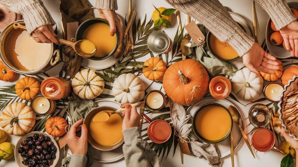 overhead shot of a table laden with pumpkins and squash