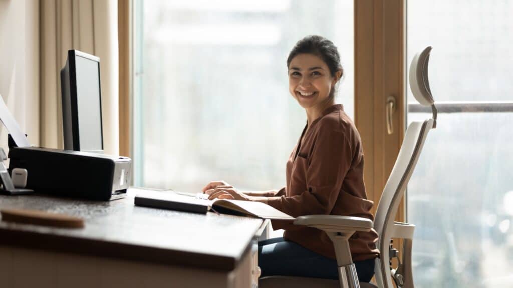 Sitting correctly in ergonomic chair. 