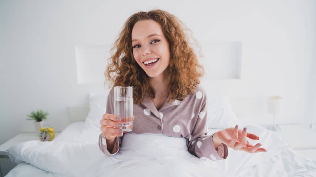 drinking water in bed. 