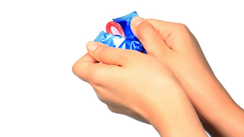 opening condom. 