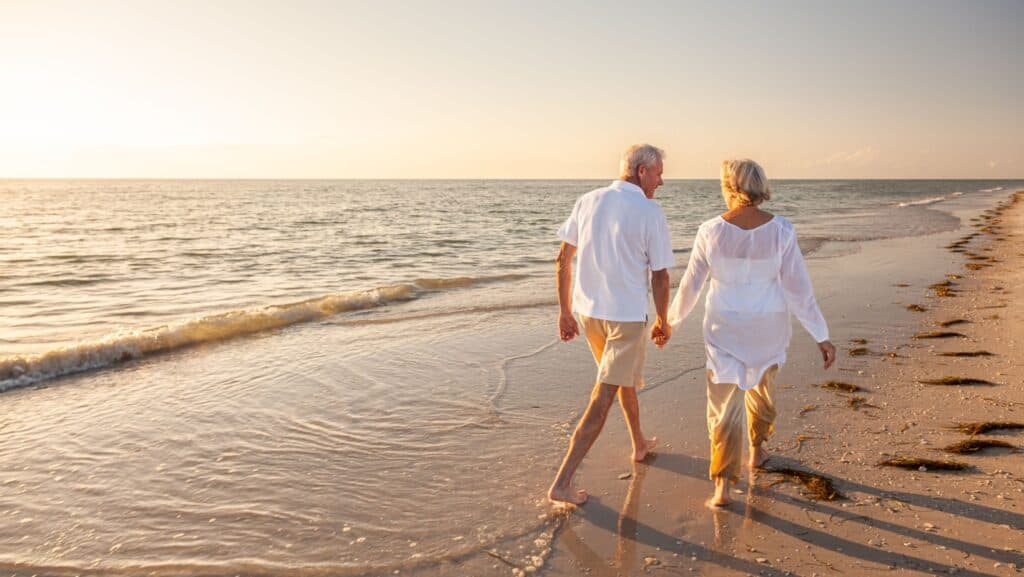 walking on beach. Couple.