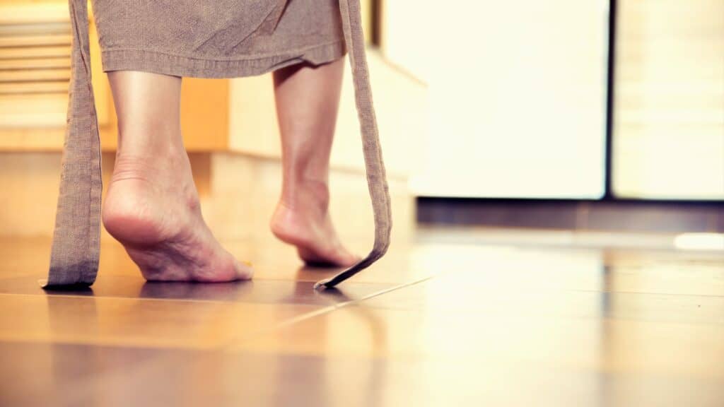 woman entering bathroom. 