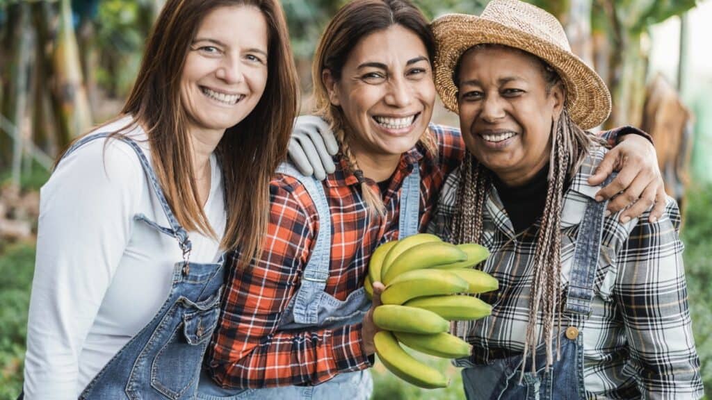 women friends on banana farm. 