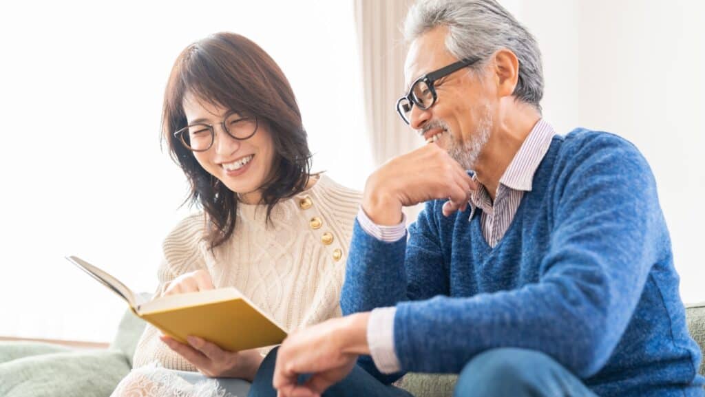 Asian couple reading.