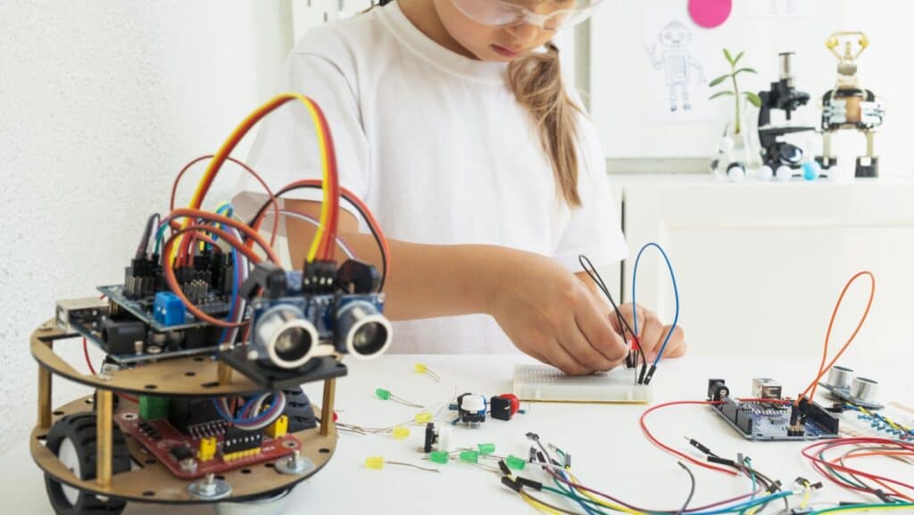 girl building robot. 