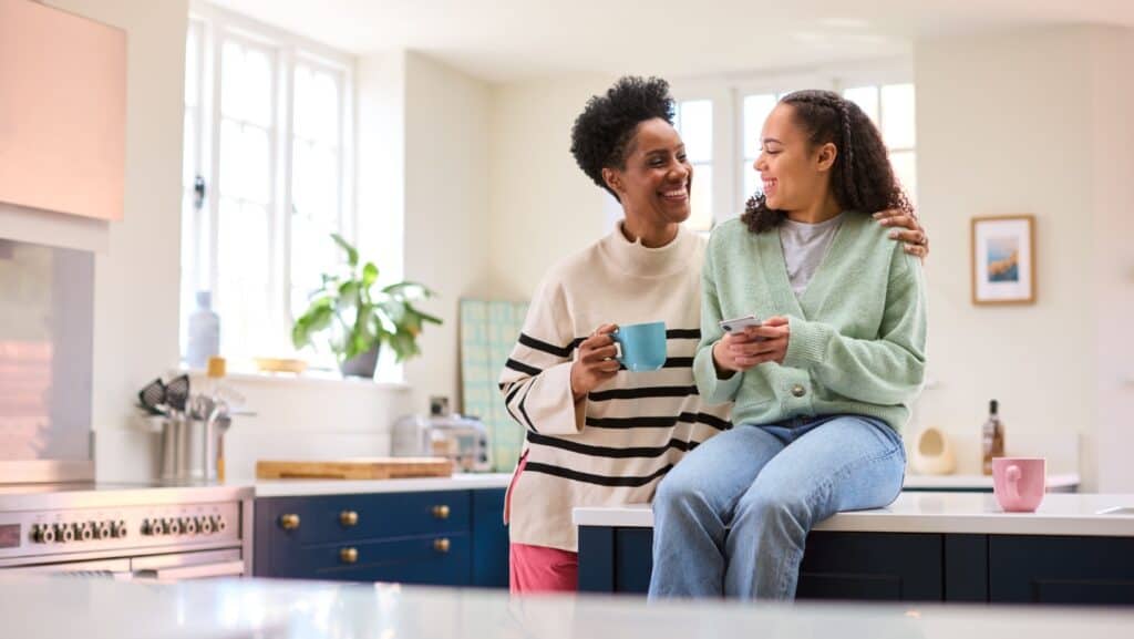 mom talking with daughter, teen.